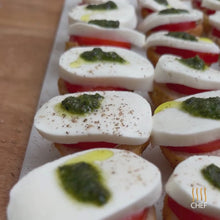 Load and play video in Gallery viewer, Mini Focaccia with Basil Pesto marinated Mozzarella and Tomato
